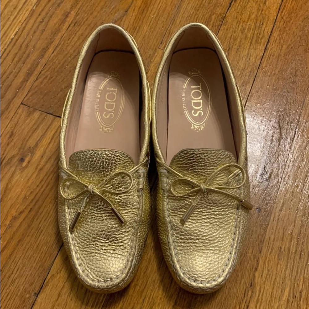 Tod’s Gommino Driving Shoes in Gold Leather